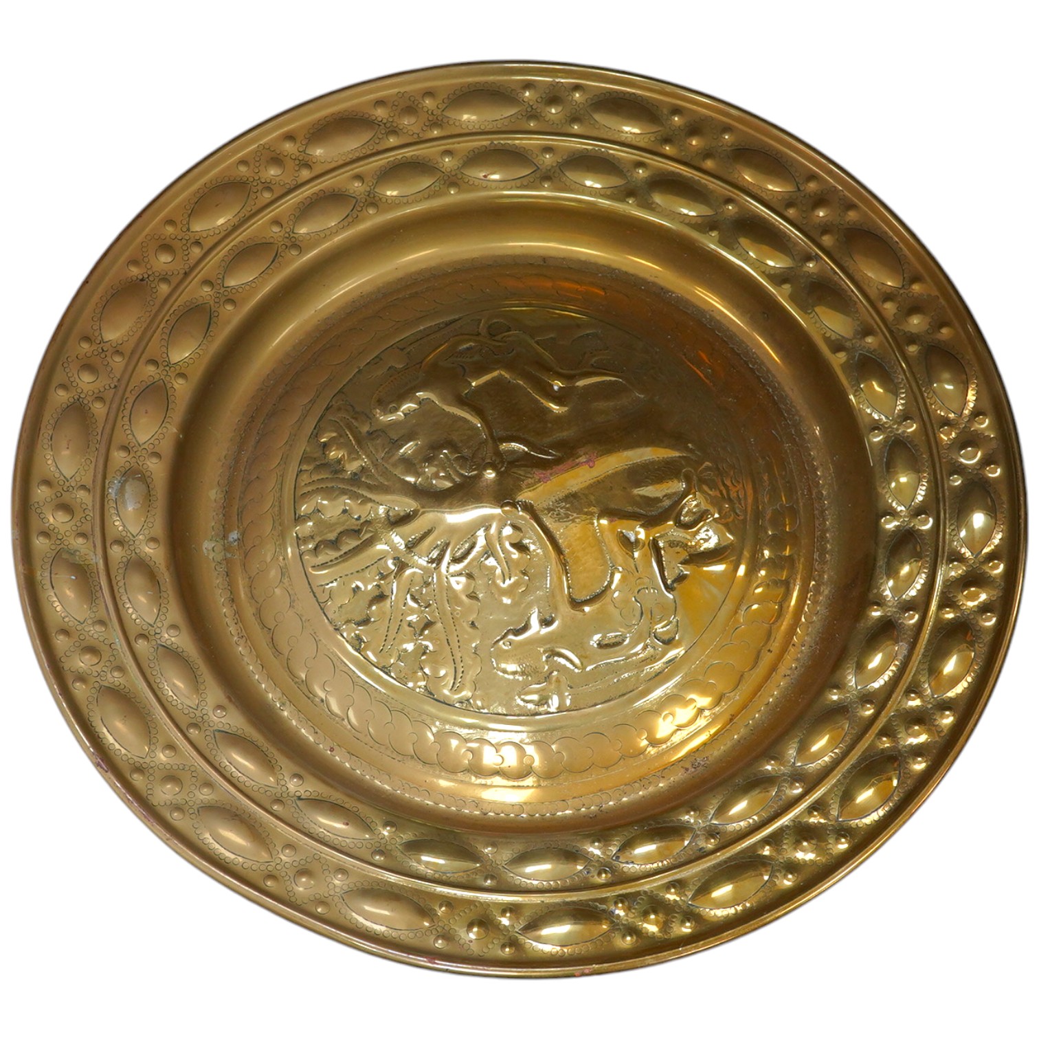 An 18th century German ‘Adam and Eve’ brass alms dish, 52cm diameter. Condition - good